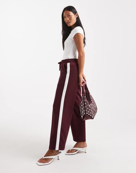 Noisy May Petite straight leg jersey trouser in burgundy with white side stripe - view 1