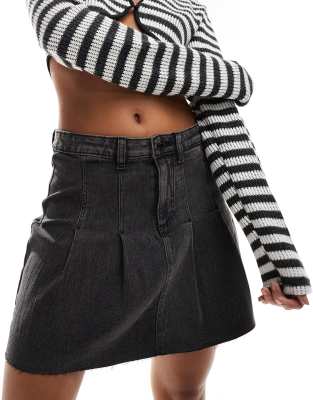 pleated denim mini skirt in washed gray