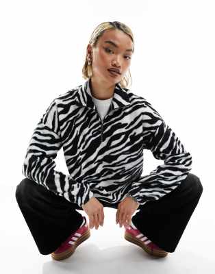 Noisy May - Pullover in Zebra-Optik mit kurzem Reißverschluss-Schwarz