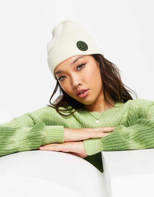 Noisy May ribbed beanie with smile face in cream