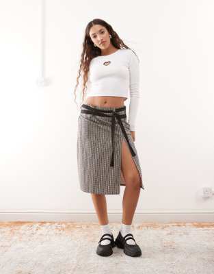 Noisy May Ribbed Long Sleeve Top With Heart Cut Out In White