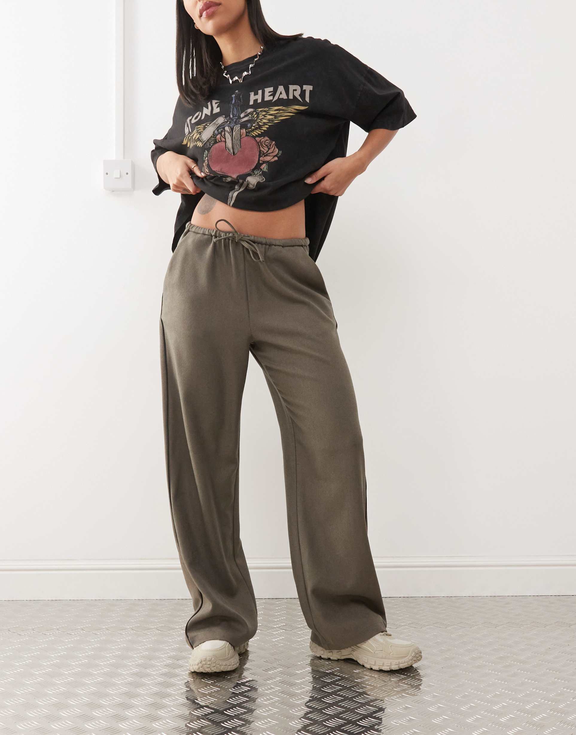 noisy may string tie loose fit pants in khaki with black piping detail