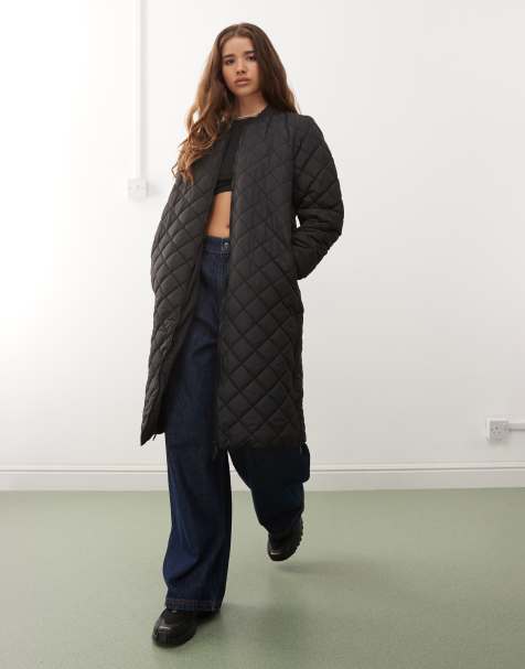 Noisy May – Svart, lång, quiltad jacka - view 1