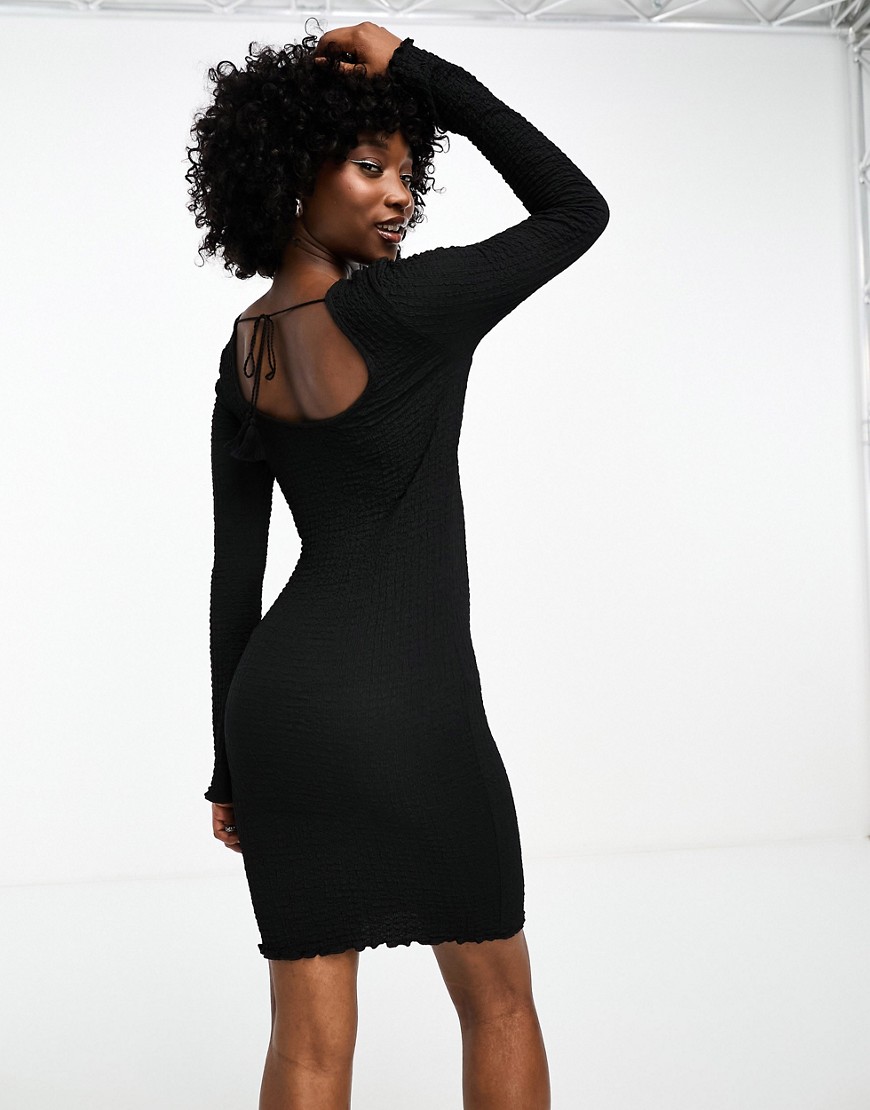 Noisy May textured bell sleeve scoop back dress in black-White