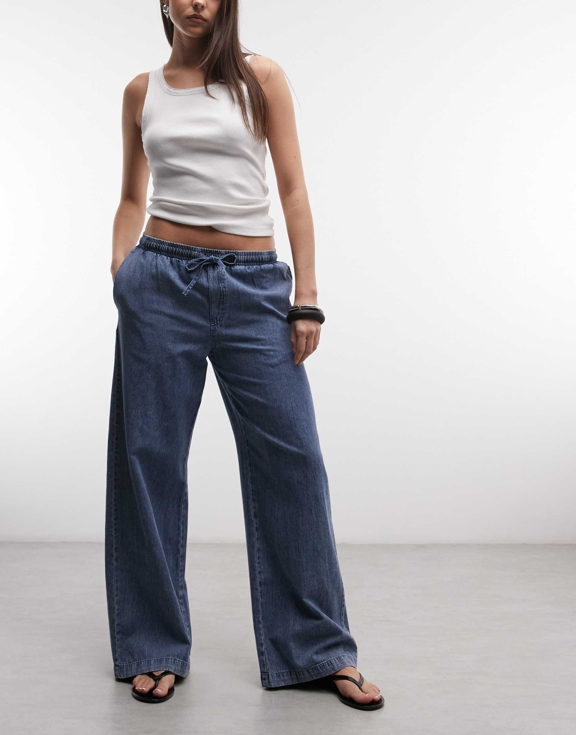 noisy may tie waist wide leg pants in washed blue denim