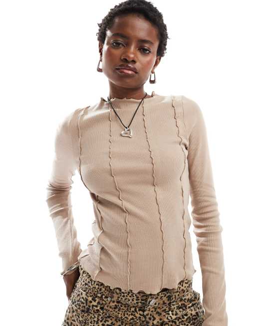 Noisy May - Top met geschulpte rand, lange mouwen en siernaden in beige