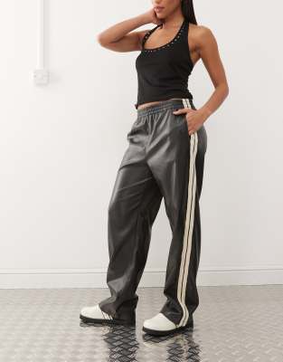 wide leg faux leather pants with side stripes in black