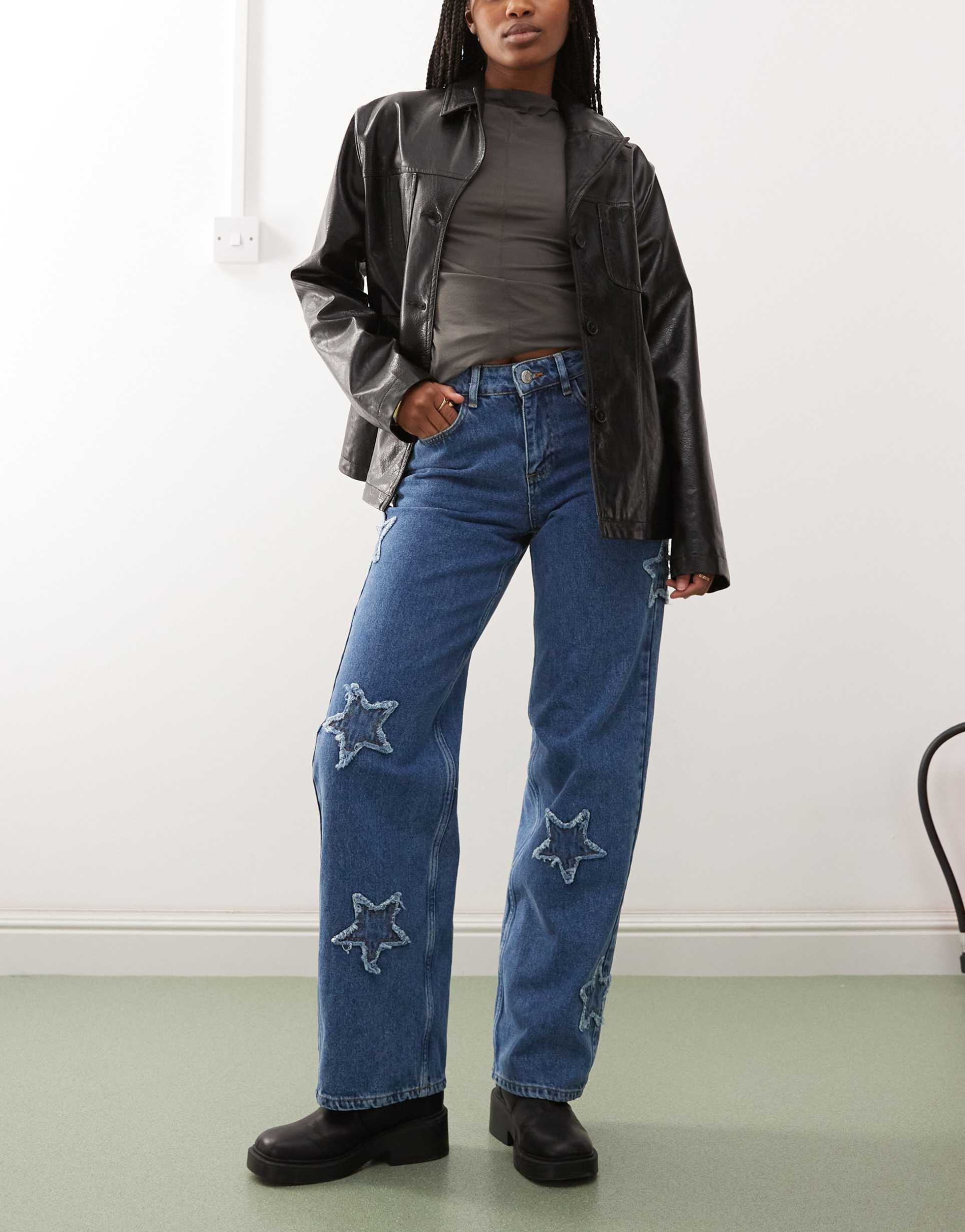 noisy may wide leg jeans with star patches in mid wash blue