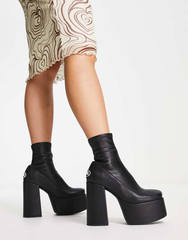 Nokwol Ellie platform ankle boots in black