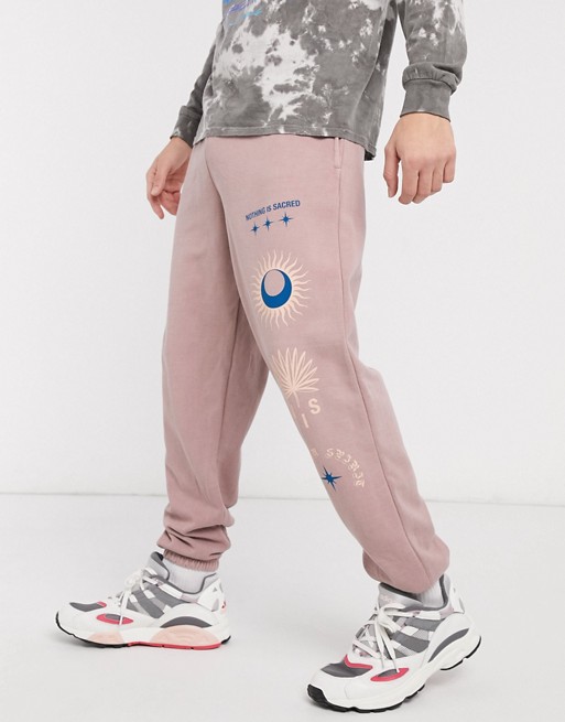 Nothing is Sacred printed jogger in dusty pink