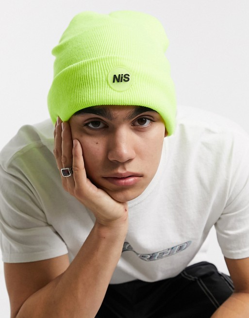 Nothing is Sacred rubber badge beanie in safety green