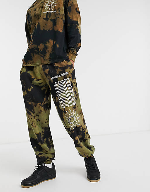 Nothing is Sacred tie dye jogger in black and green | ASOS