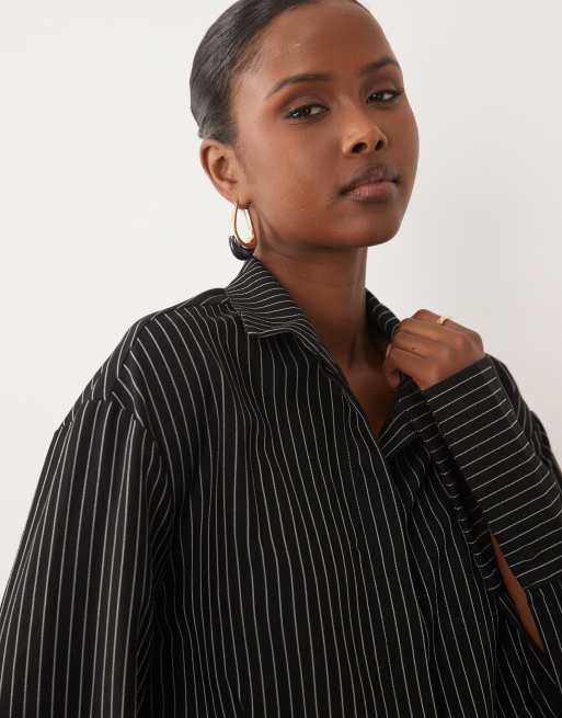 Noughts & Kisses cotton rich button up asymmetric hem deep cuff mini shirt dress in black pinstripe