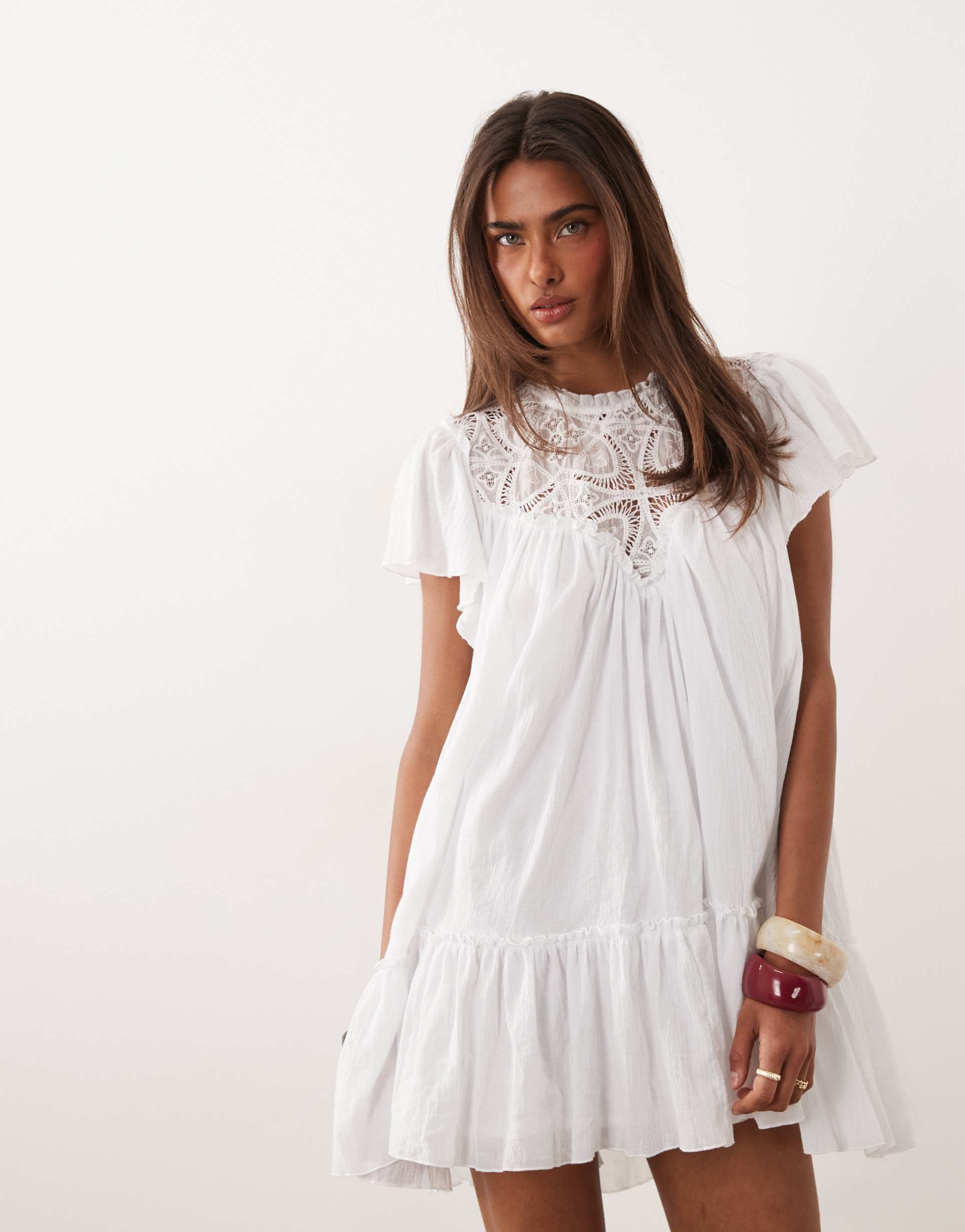 noughts & kisses crochet insert flutter sleeve dropped hem mini dress in white