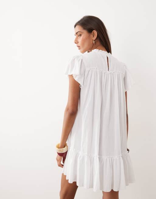 Noughts & Kisses crochet insert flutter sleeve dropped hem mini dress in white, 3 of 4
