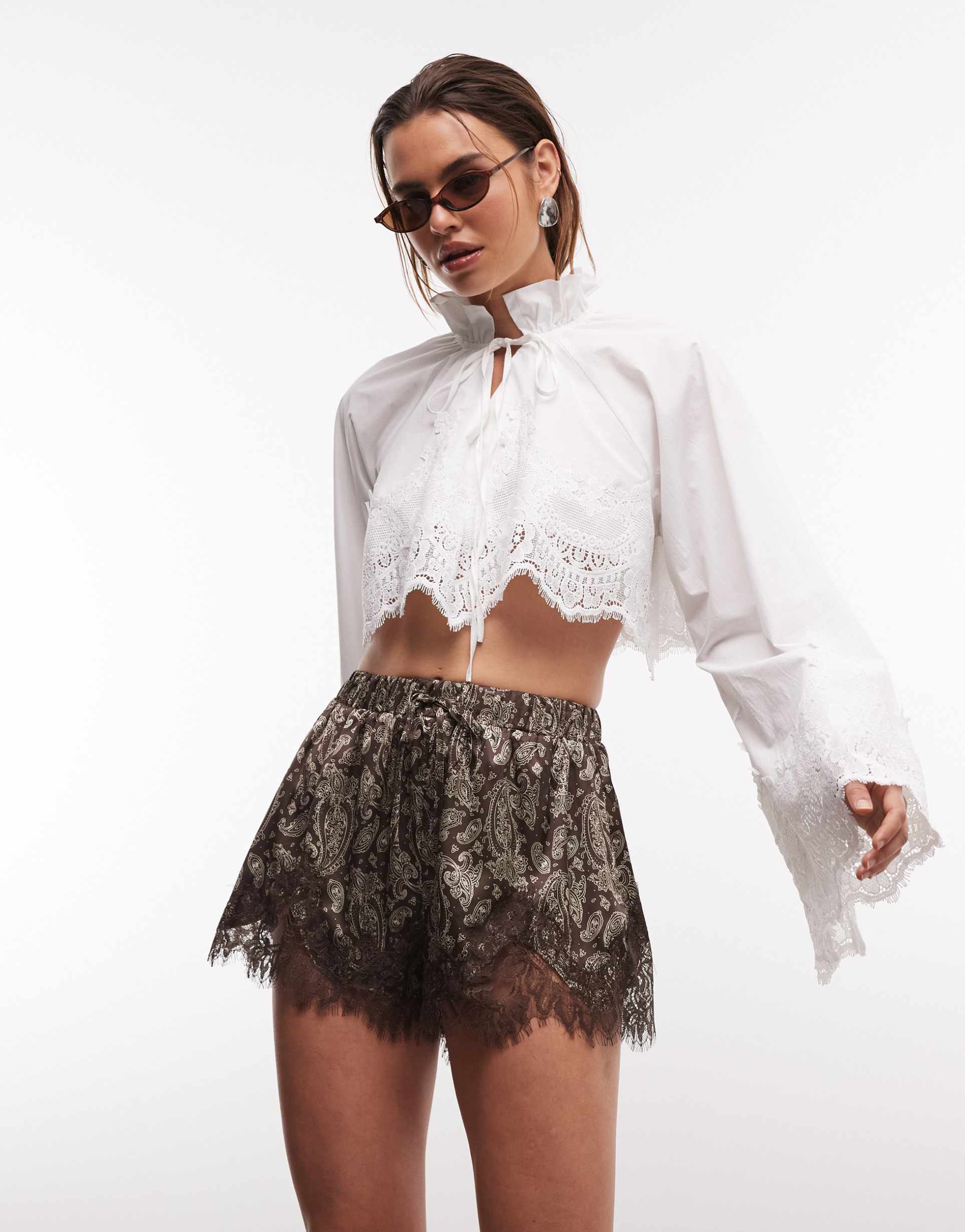 noughts & kisses flared sleeve scalloped lace hem tie detail cropped shirt in white