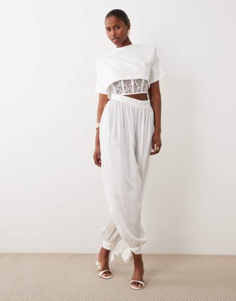 Noughts & Kisses lace corset waist detail top and satin balloon leg tie detail trouser co-ord in white - view 1