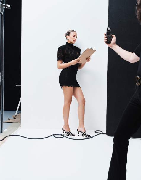 Noughts & Kisses Orla lace high neck shoulder pad blouson mini dress in black - view 1