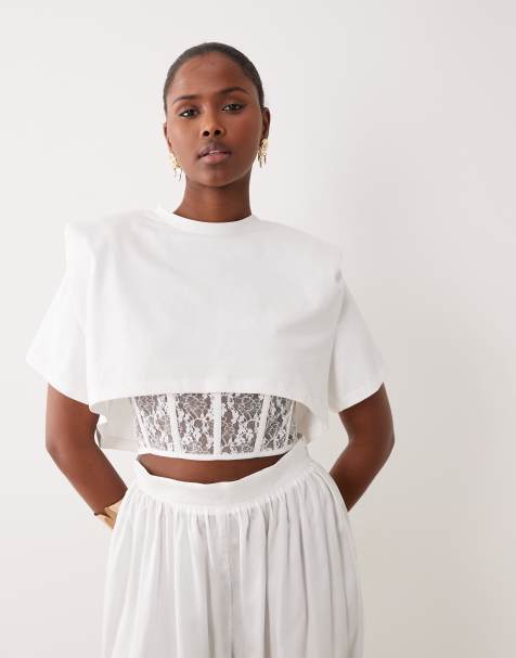 Noughts & Kisses padded shoulder lace corset waist detail top co-ord in white - view 1