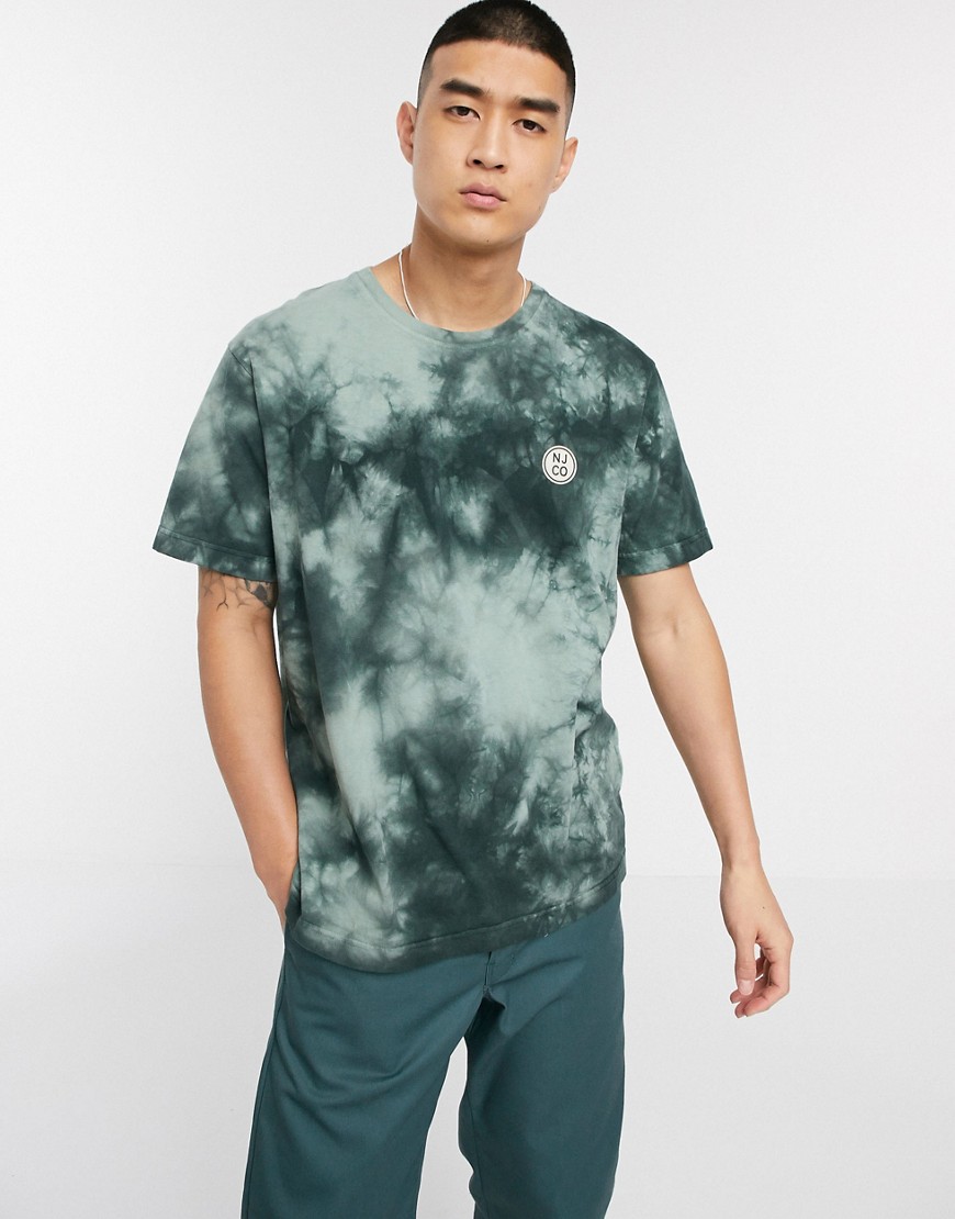 Nudie Jeans Co – Uno – Ljusgrön batikmönstrad t-shirt med cirkellogga