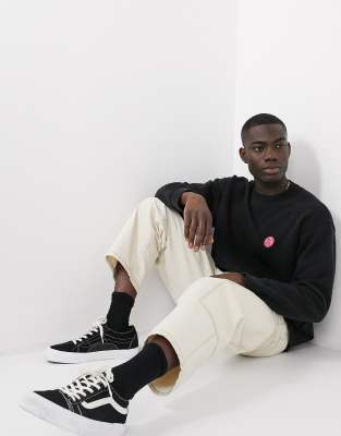 Nudie Jeans Lukas badge logo sweatshirt in black ASOS