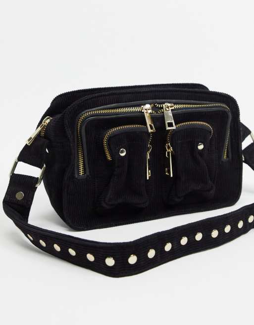 Nunoo Ellie corduroy cross body bag in black with gold hardware