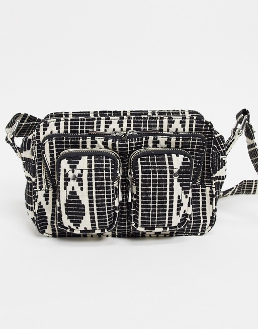 Nunoo Ellie mountain bag with front pockets in black & white