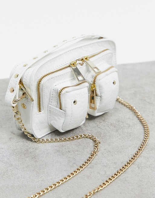 Nunoo Helena cross body bag in white with gold hardware