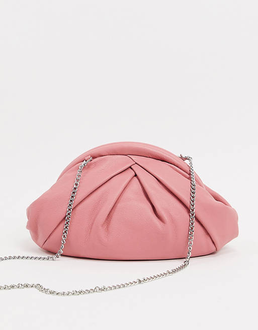 Nunoo Saki leather slouchy pillow clutch with detachable chain strap in pink