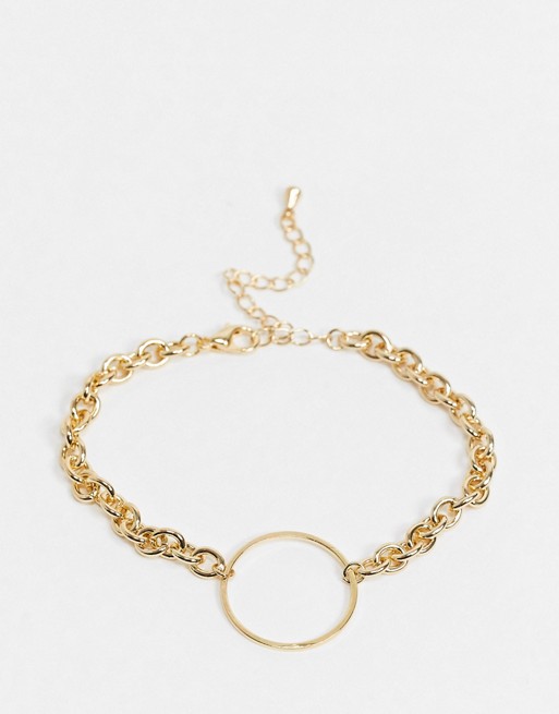 Nylon chain bracelet with circle pendant in gold