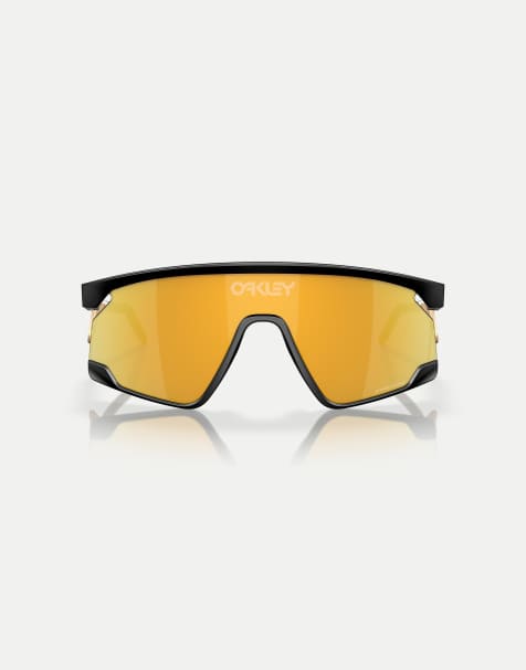 Oakley Bxtr metal shield sunglasses with gold mirrored lens in matte black - view 1