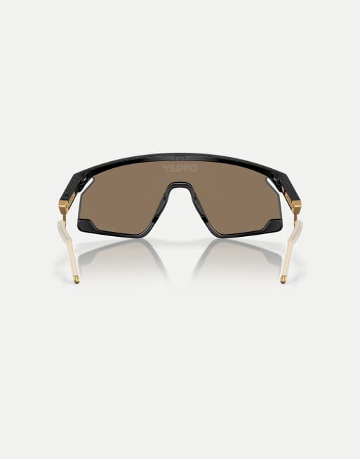 Oakley Bxtr metal shield sunglasses with gold mirrored lens in