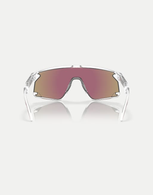 Oakley Bxtr shield sunglasses with blue mirrored lens in clear | ASOS
