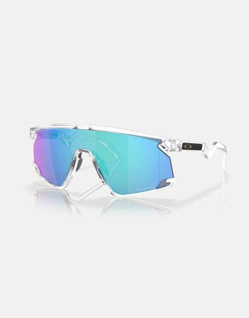 Oakley Bxtr shield sunglasses with blue mirrored lens in clear | ASOS