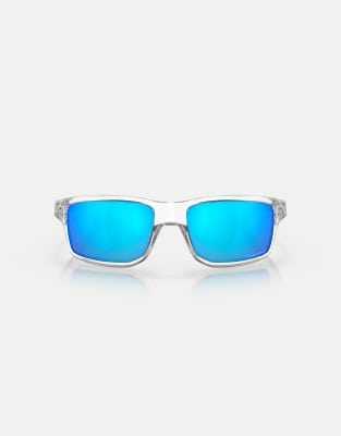 Oakley Gibston rectangle sunglasses with blue mirrored lens in polished clear - view 1