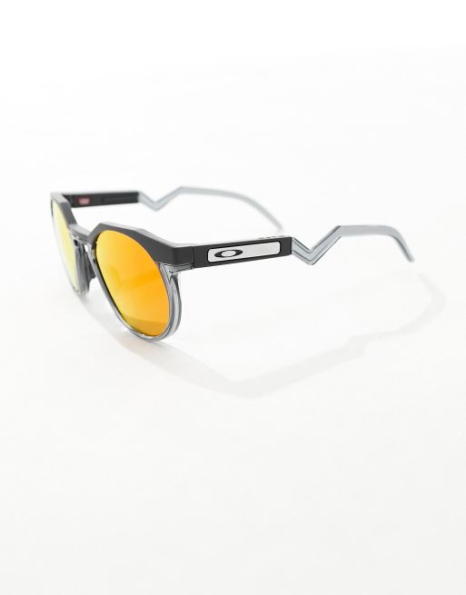Oakley - HSTN - Occhiali da sole rotondi neri con lenti arancioni riflettenti , 3 di 4