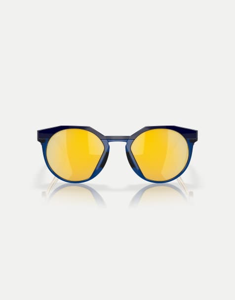 Oakley Kylian mbappé signature series hstn round polarised sunglasses with gold mirrored lens in navy/transparent blue - view 1