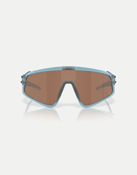 Oakley – Kylian Mbappé Signature Series Latch™ – Shield-Sonnenbrille in transparentem Stonewash mit verspiegelten braunen Gläsern und Paneel-Detail - view 1