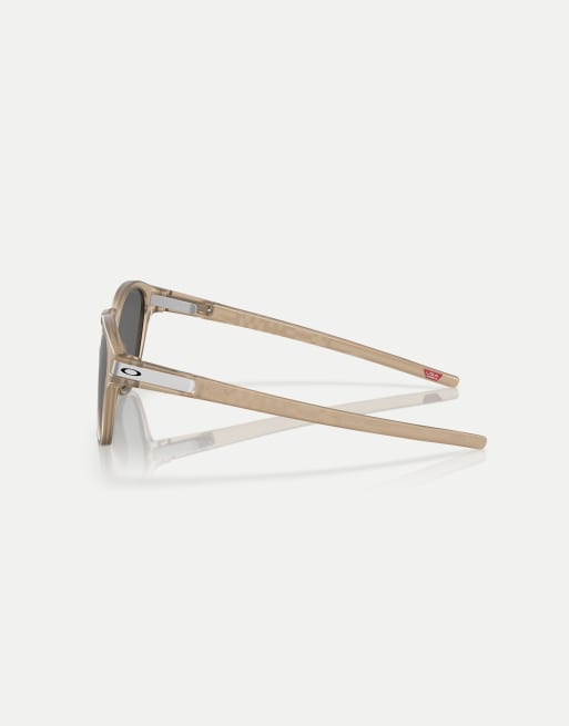 Oakley Latch™ introspect collection round polarised sunglasses with black mirrored lens in matte sepia, 2 of 3