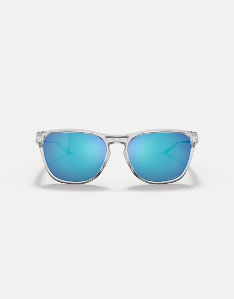 Oakley Manorburn square sunglasses with blue mirrored lens in polished clear - view 1