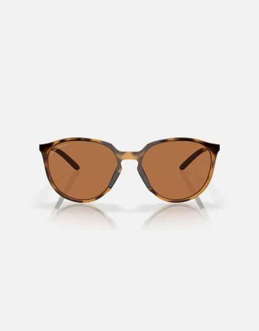 Oakley Sielo round polarised sunglasses with brown lens in polished brown tortoise, 3 of 4