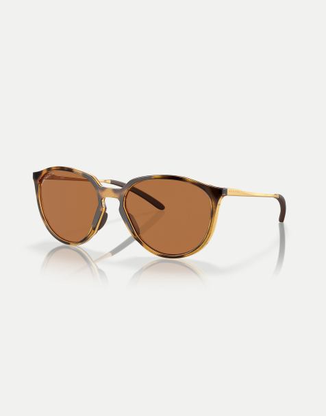 Oakley – Sielo – Runde, polarisierte Sonnenbrille in Schildpatt-Braun mit polierter Oberfläche und braunen Gläsern - view 1