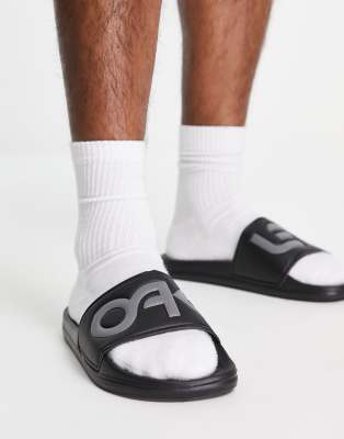 Oakley Summerville slides in black | ASOS