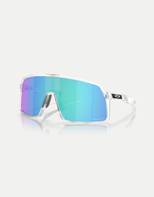 Oakley - Sutro - Occhiali da sole a mascherina colore trasparente con lenti a specchio blu