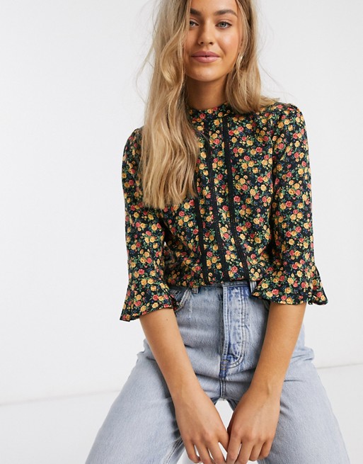 Oasis ditsy floral lace trim blouse with fluted sleeves | ASOS