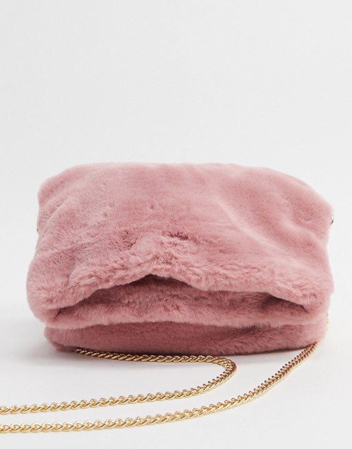 Oasis faux fur fold over clutch bag in pink