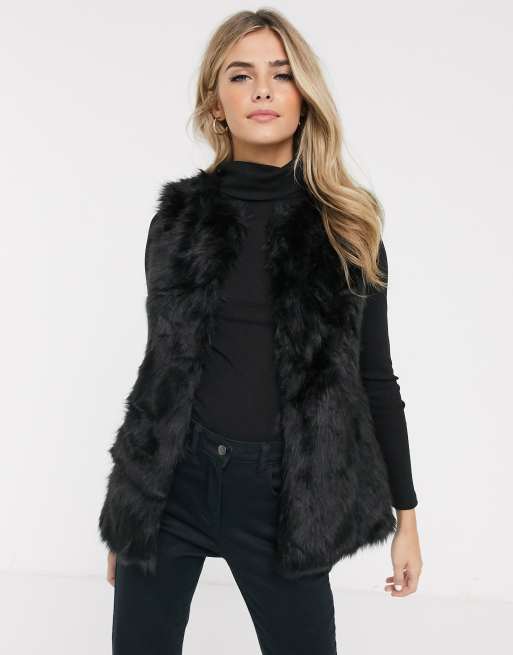 black faux fur gilets