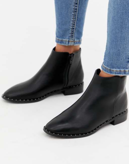 Black flat shop stud boots