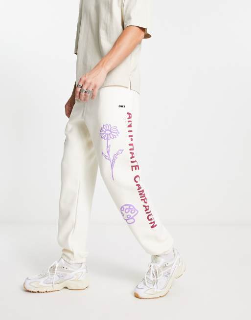 Obey - Anti - Joggingbroek met print in gebroken wit