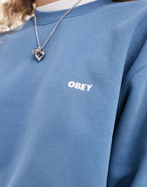 Obey – Blå sweatshirt i unisex-modell med logga baktill, 2 av 4